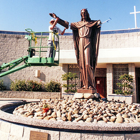 repairing the arm of the statue